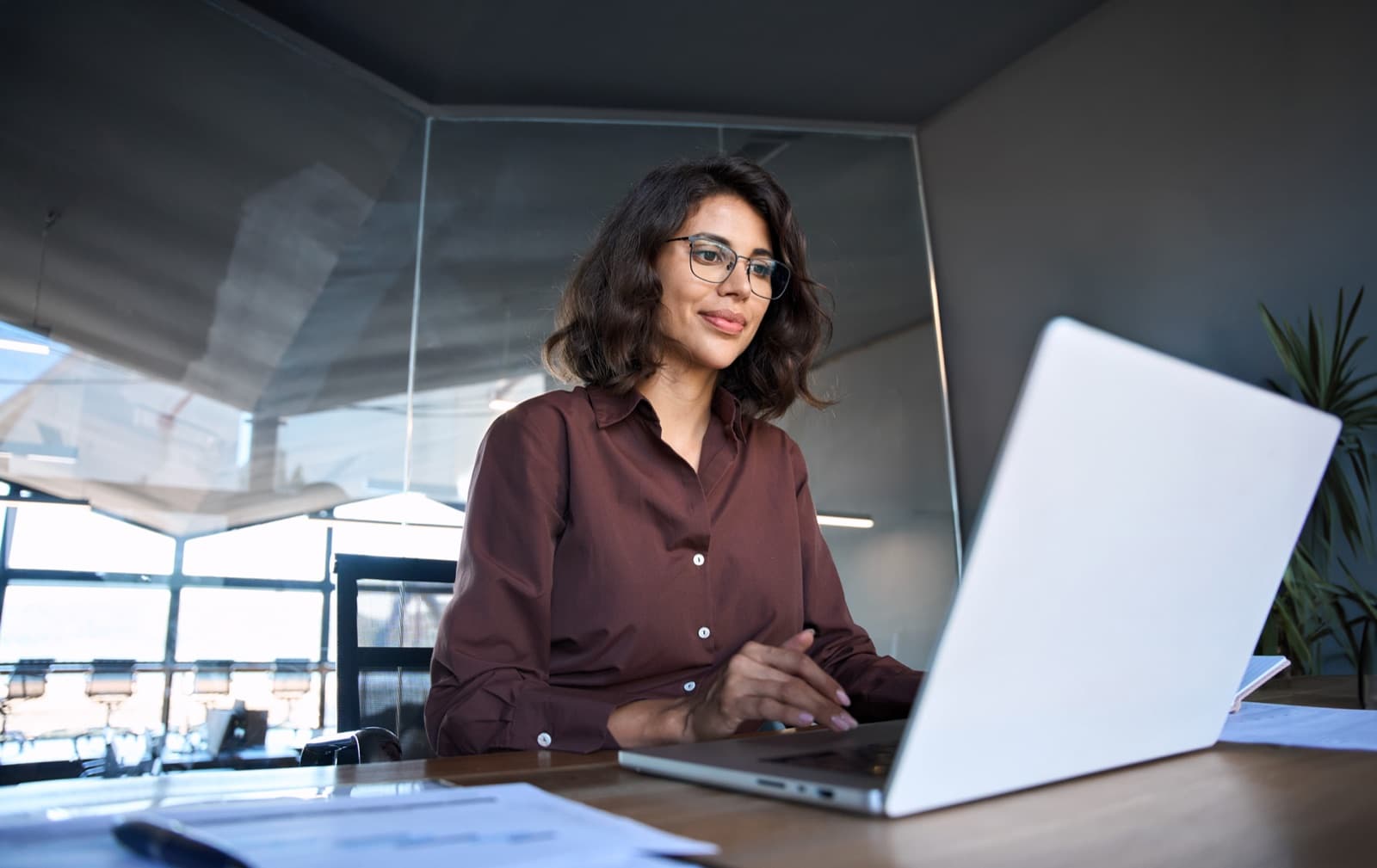 Professional working on HR strategy at her desk